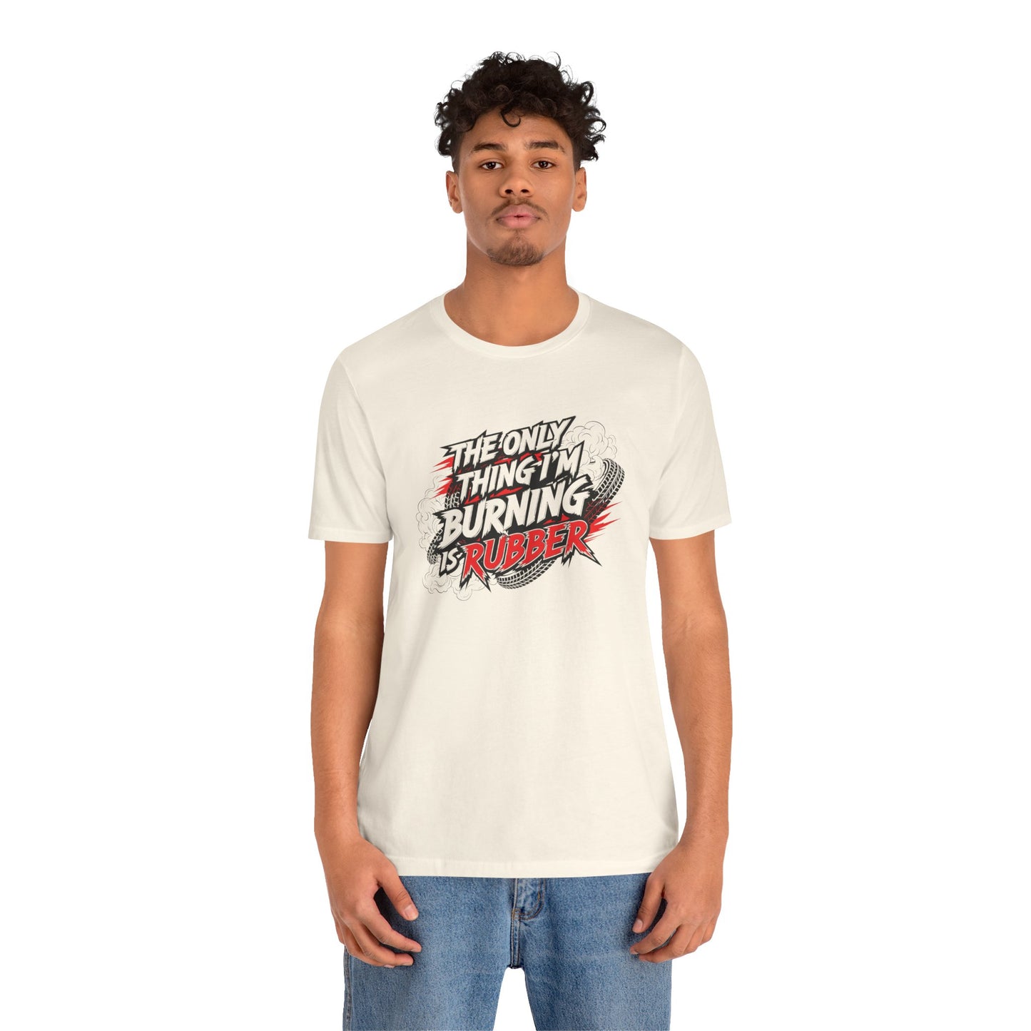 Person wearing a white t-shirt with graphic design and text 'The only thing I'm burning is rubber' on a white background