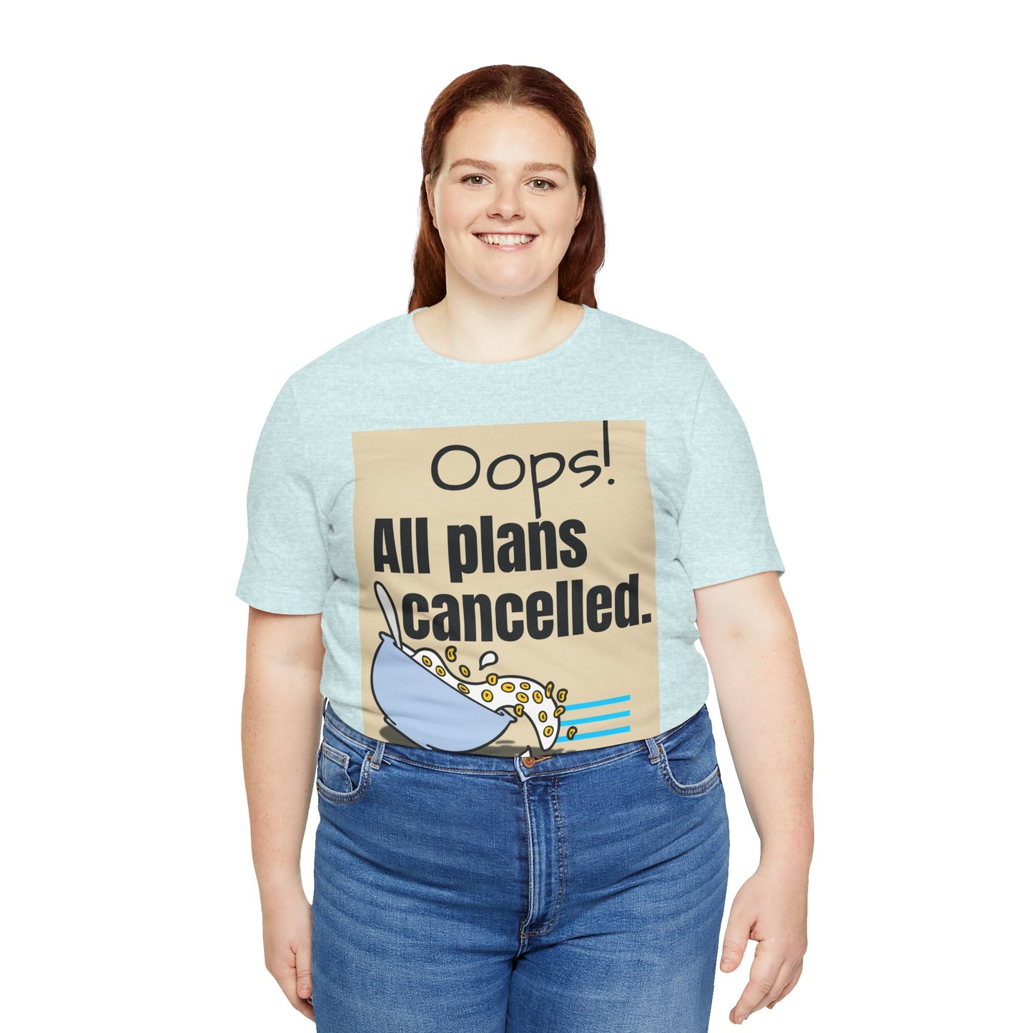 Person wearing a light blue t-shirt with a graphic and text 'Oops! All plans cancelled.'
