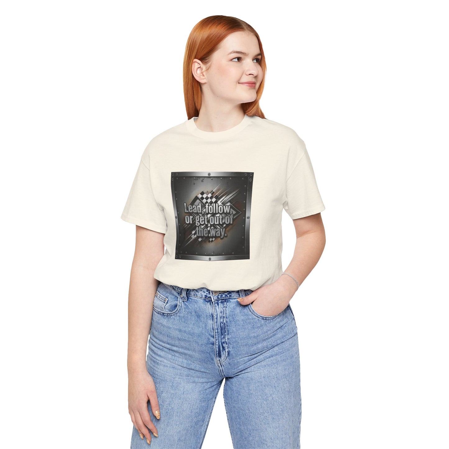Person wearing a white t-shirt with a graphic design and text 'Lead, follow, or get out of the way' and blue jeans on a white background