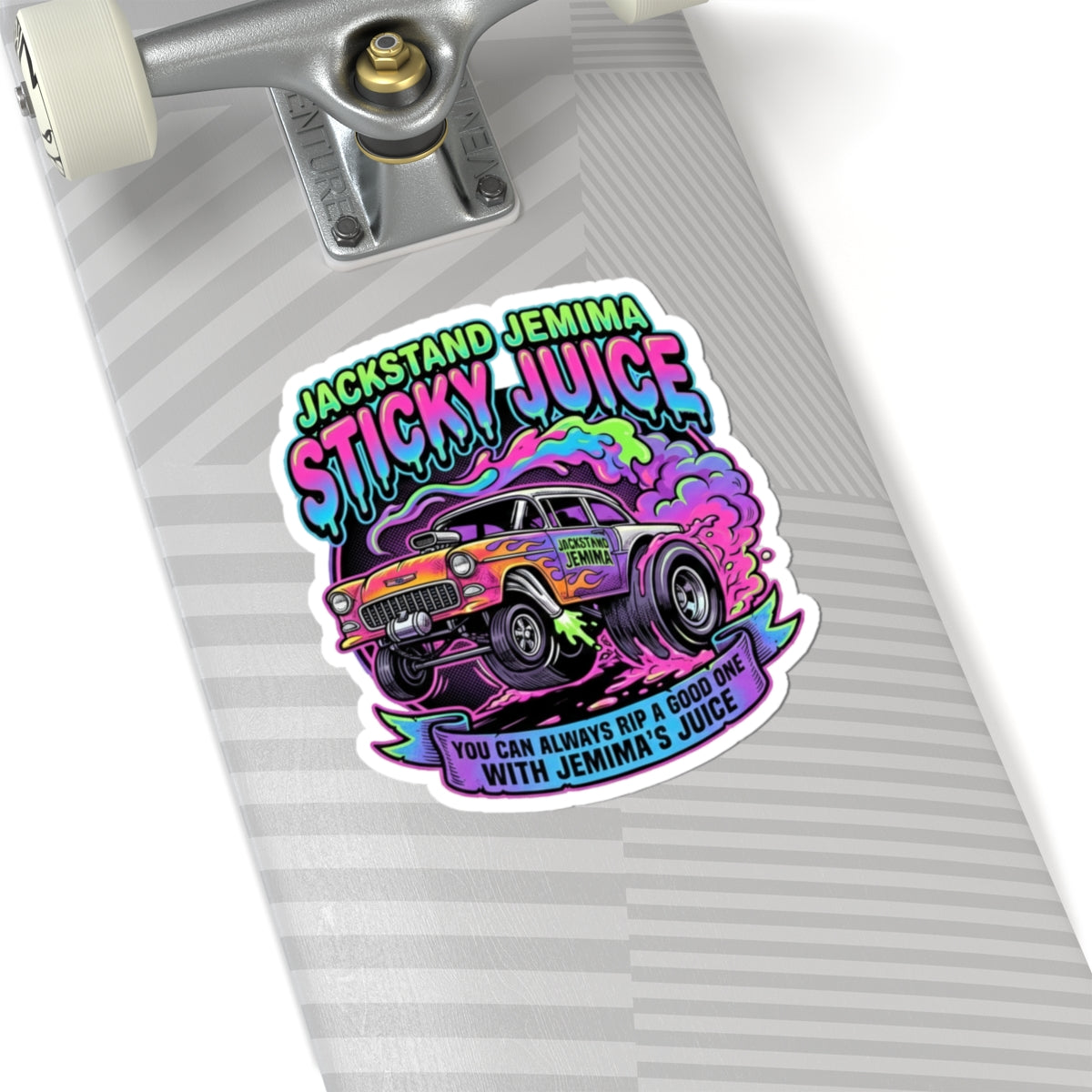 Sticker on a skateboard deck with colorful design and 'Jackstand Jemima Sticky Juice You Can Always Rip A Good One With Jemima's Juice' text.