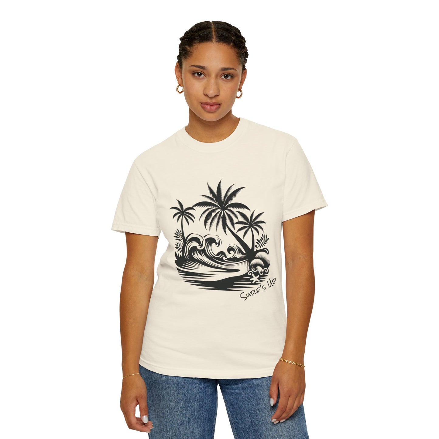 Person wearing a white t-shirt with a black palm tree and wave design on a white background
