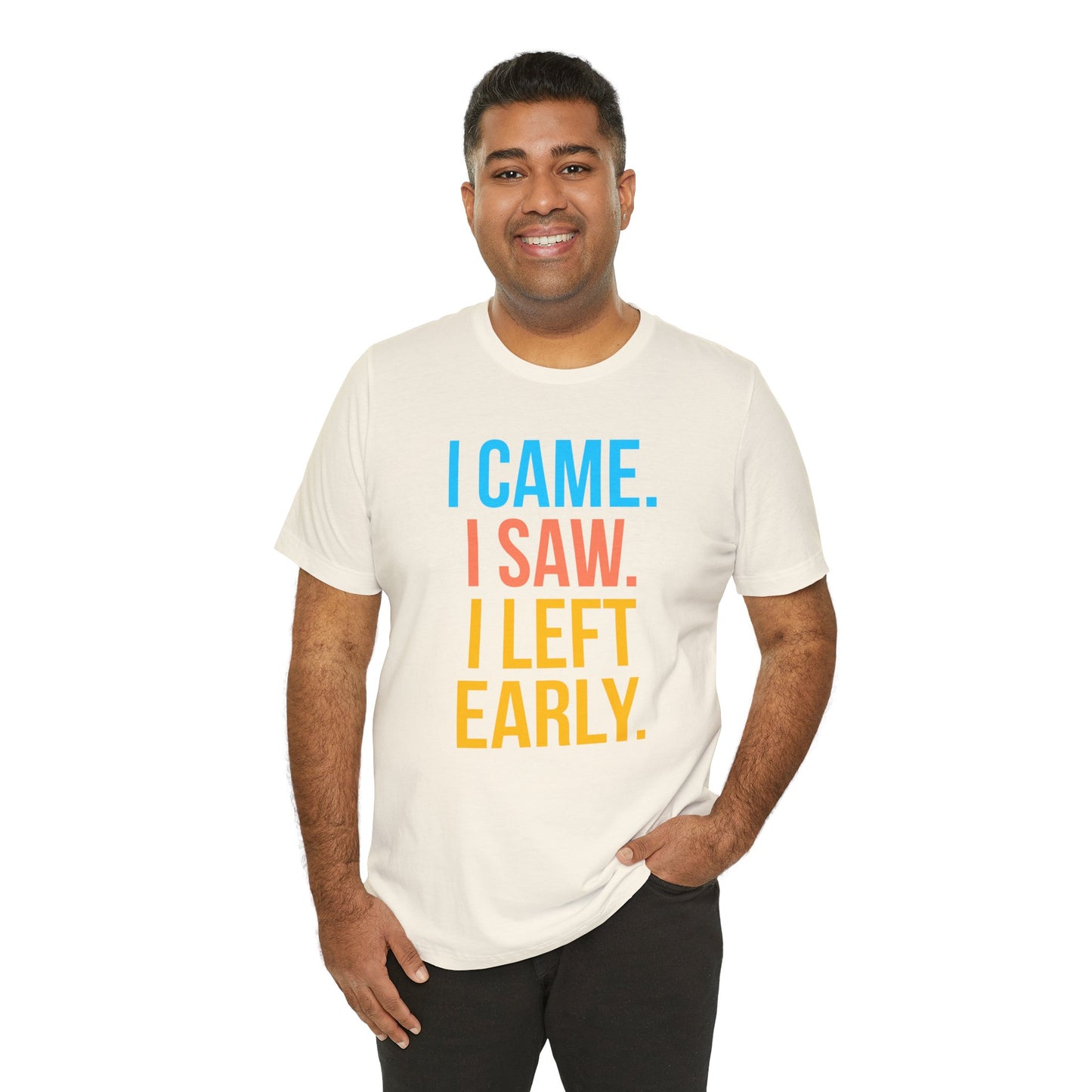 Man wearing a white t-shirt with colorful text 'I CAME. I SAW. I LEFT EARLY.' on a white background