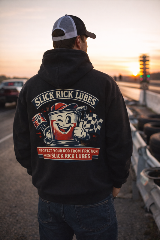 Person wearing a hoodie with 'Slick Rick Lubes' graphic on a sunset background