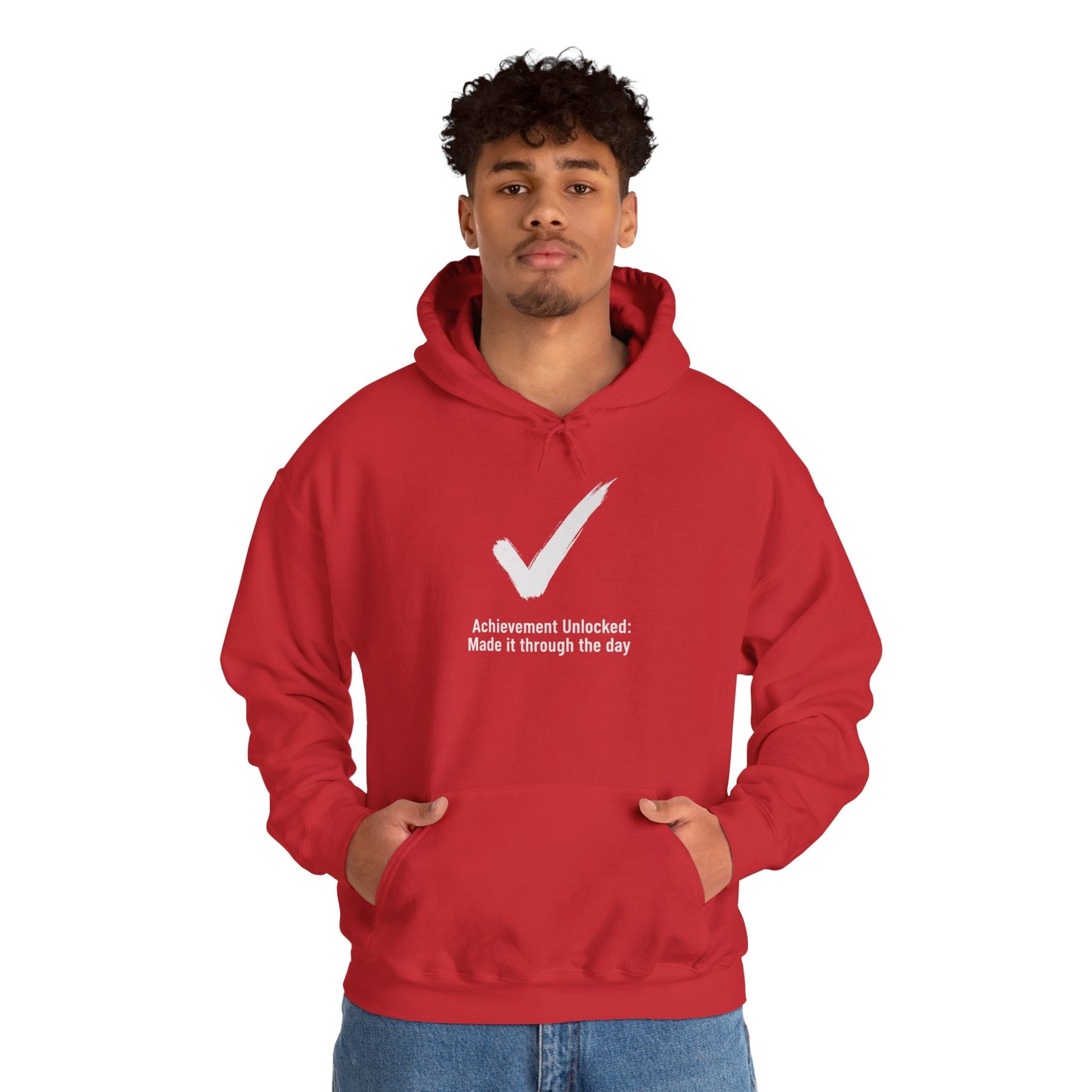 Person wearing a red hoodie with a white checkmark and text 'Achievement Unlocked: Made it through the day' on a white background
