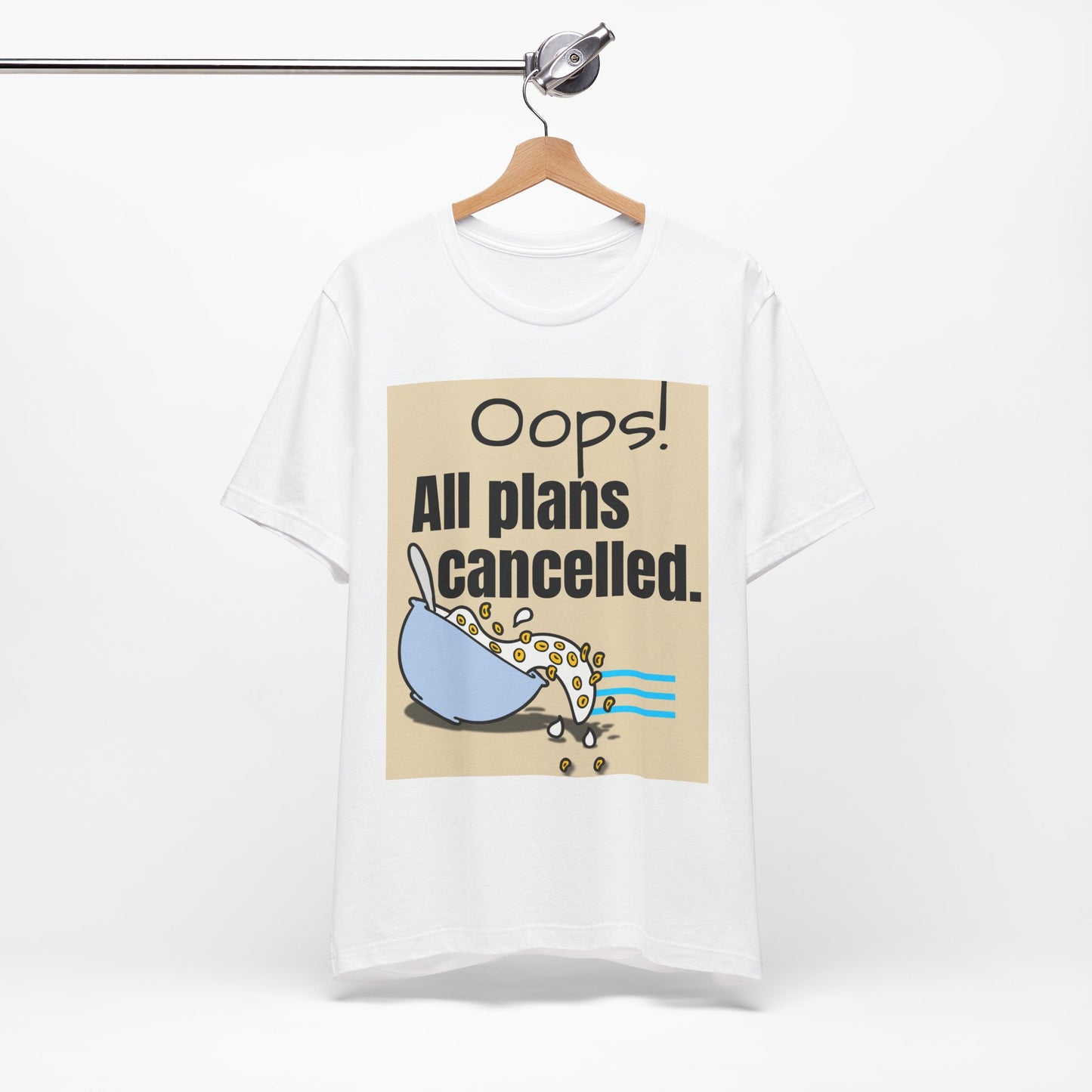 White sweatshirt with graphic design and text 'Oops! All plans cancelled.' on a white background