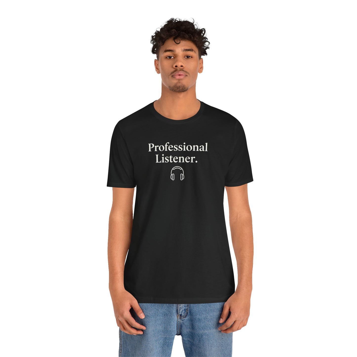 Person wearing a black Bella+Canvas 3001 t-shirt with 'Professional Listener' text and headphones graphic on a white background