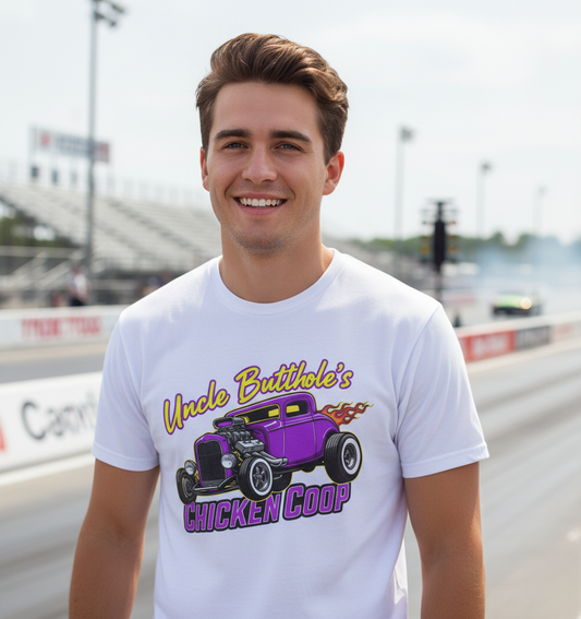 Man wearing a white Bella+Canvas 3001 t-shirt with Uncle Butthole's Chicken Coop purple hot rod t-shirt with flaming drag racer graphic 