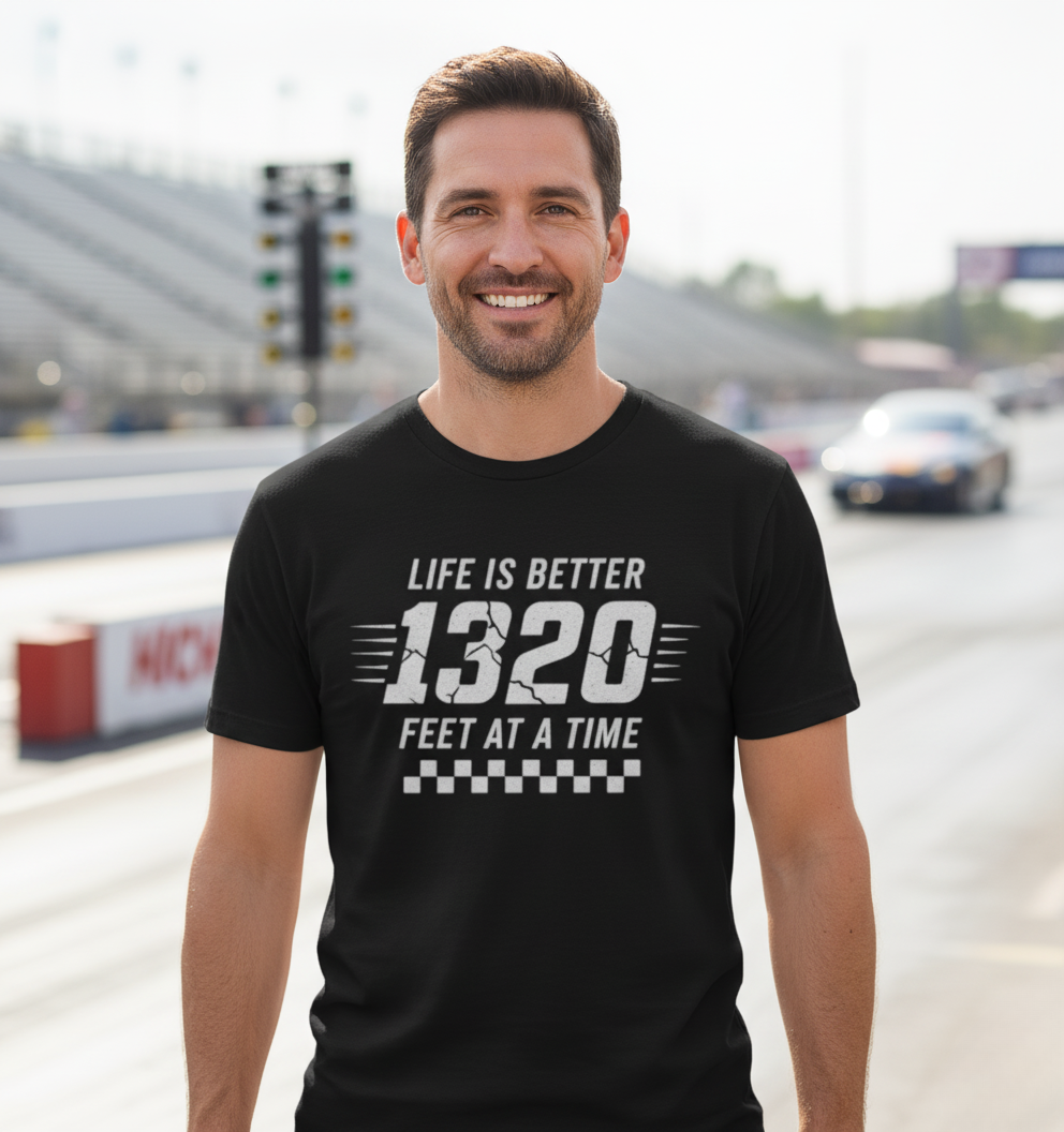 Drag racer wearing black 1320 feet Bella Canvas t-shirt quarter mile motorsports apparel
