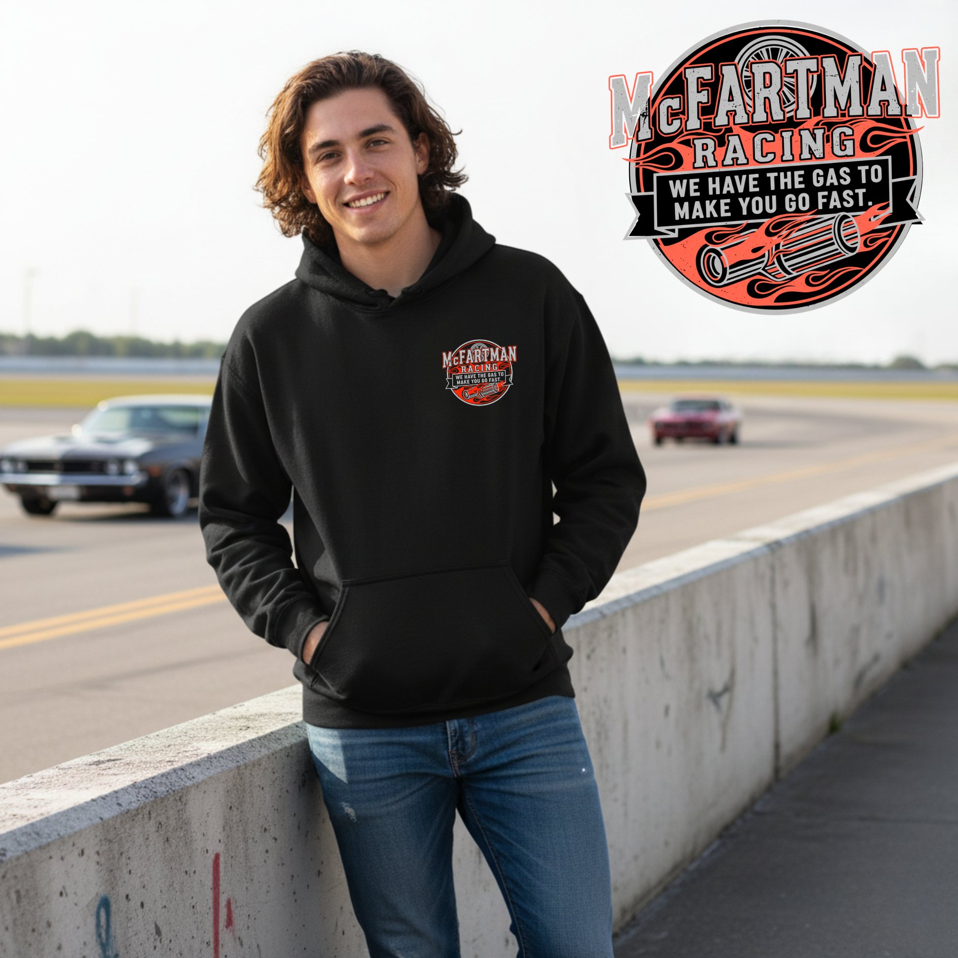 Person wearing a black hoodie with McFartman Racing logo on a race track background