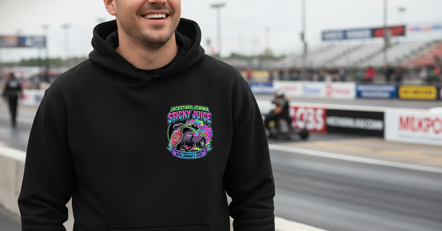 Person wearing a black hoodie with a colorful graphic 'Jackstand Jemima' logo on a race track background
