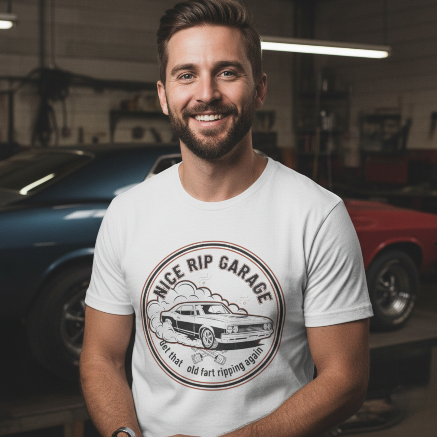 Man wearing a white t-shirt with 'Nice Rip Garage' graphic in a garage setting