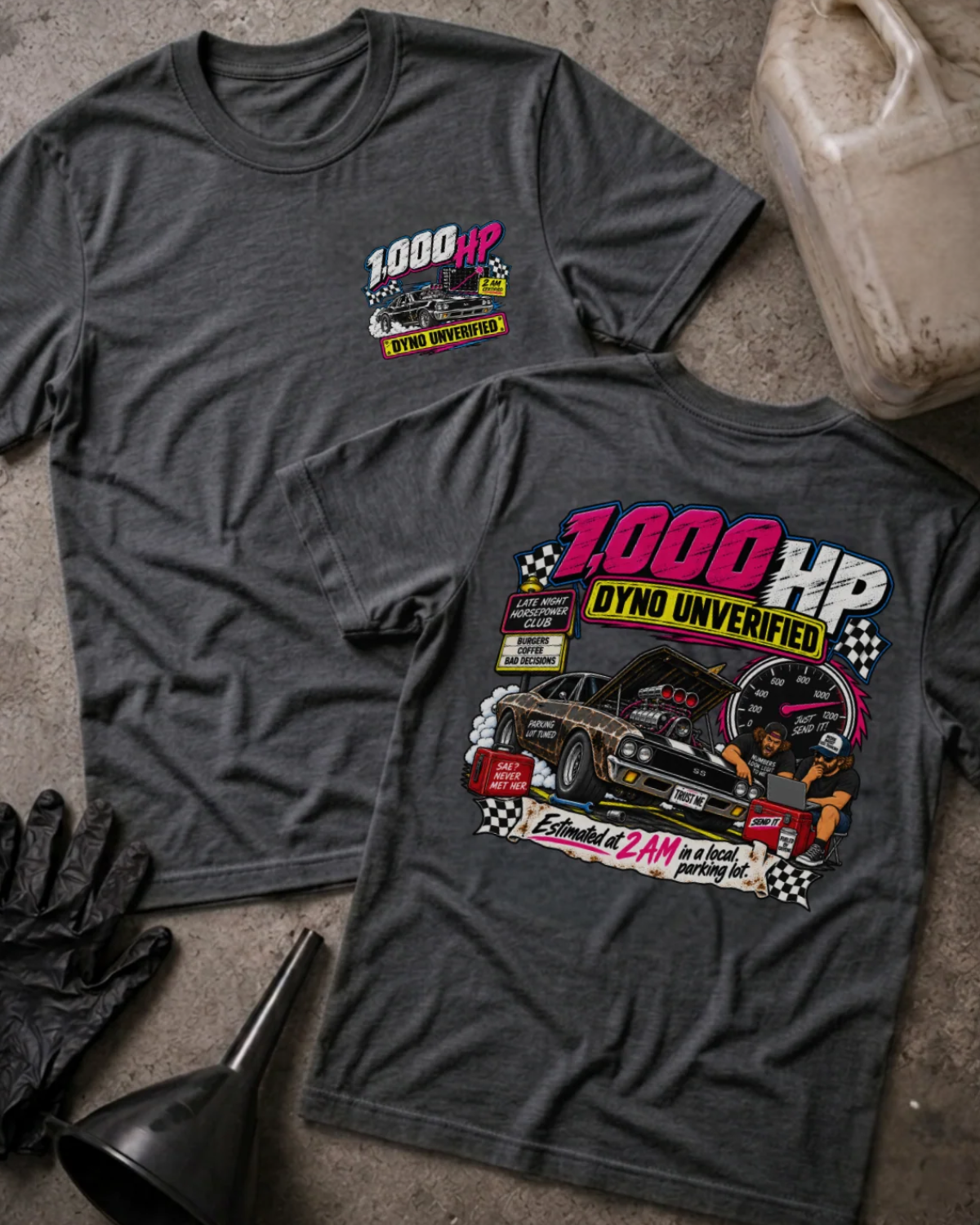 Front and back of 1,000 HP Dyno Unverified dark grey heather T-shirt with chest logo, muscle car with open hood, tachometer, and “Estimated at 2 AM in a local parking lot” slogan.