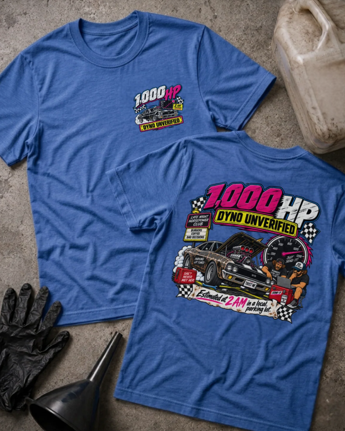 Front and back of 1,000 HP Dyno Unverified heather true royal T-shirt with chest logo, muscle car with open hood, tachometer, and “Estimated at 2 AM in a local parking lot” slogan.