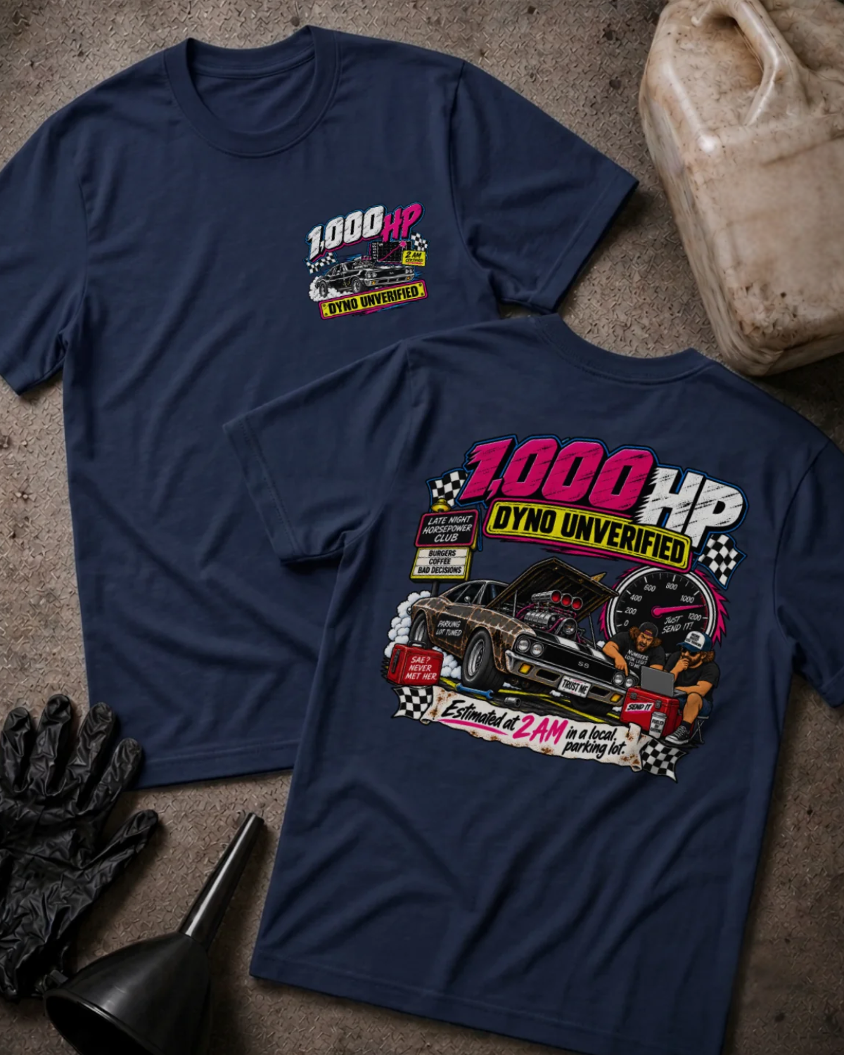 Front and back of 1,000 HP Dyno Unverified navy T-shirt with chest logo, muscle car with open hood, tachometer, and “Estimated at 2 AM in a local parking lot” slogan.