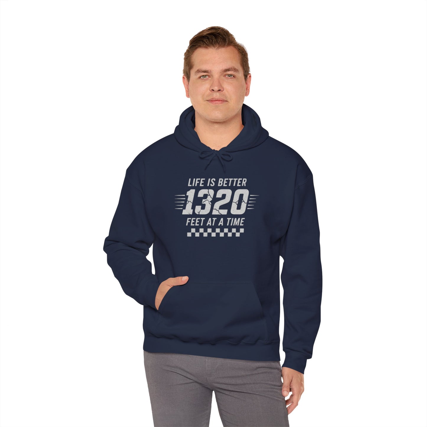 Man wearing a navy hoodie with text 'Life is better 1320 feet at a time' on a white background