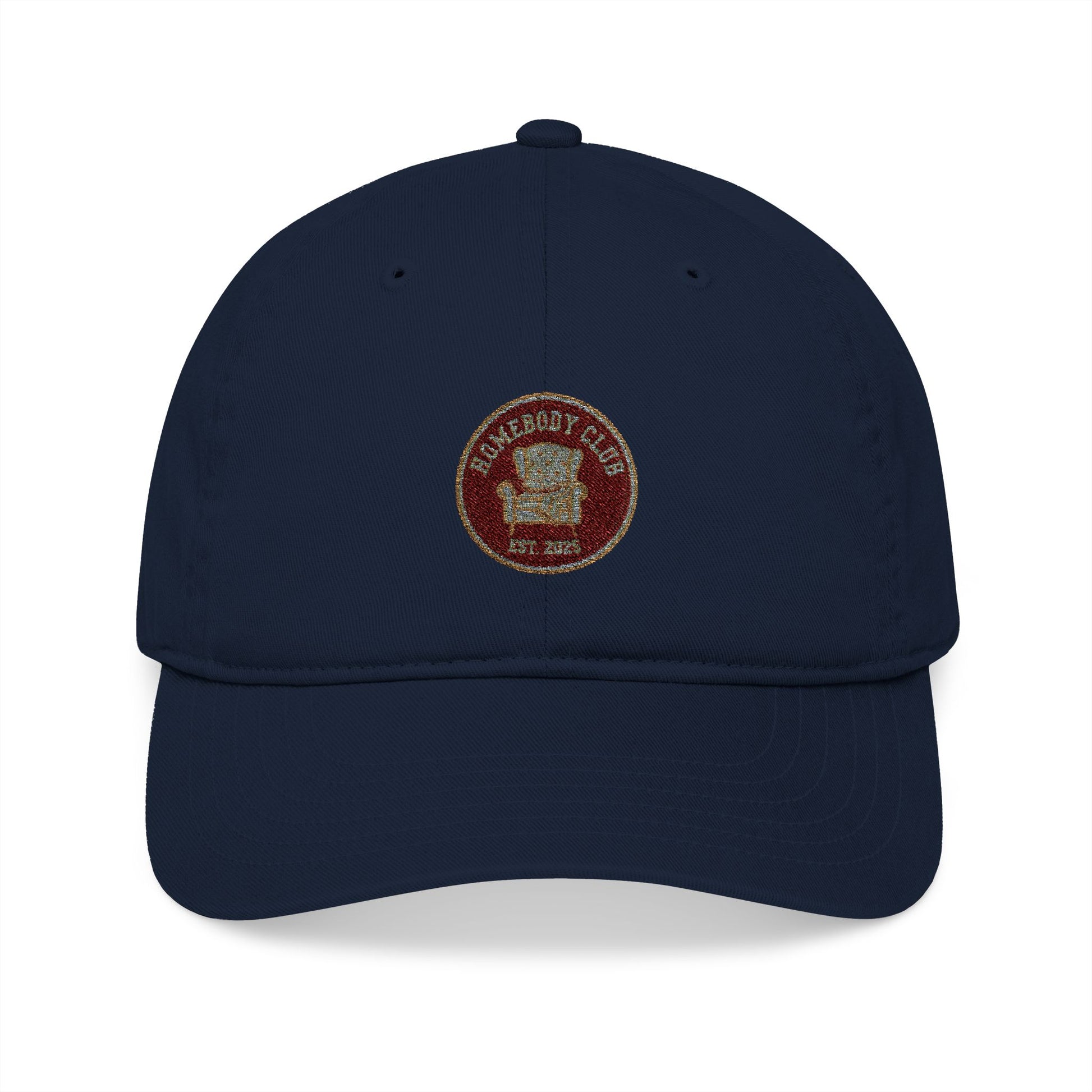 Navy blue cap with a red and gold emblem and text 'Homebody club Est. 2025' on a white background