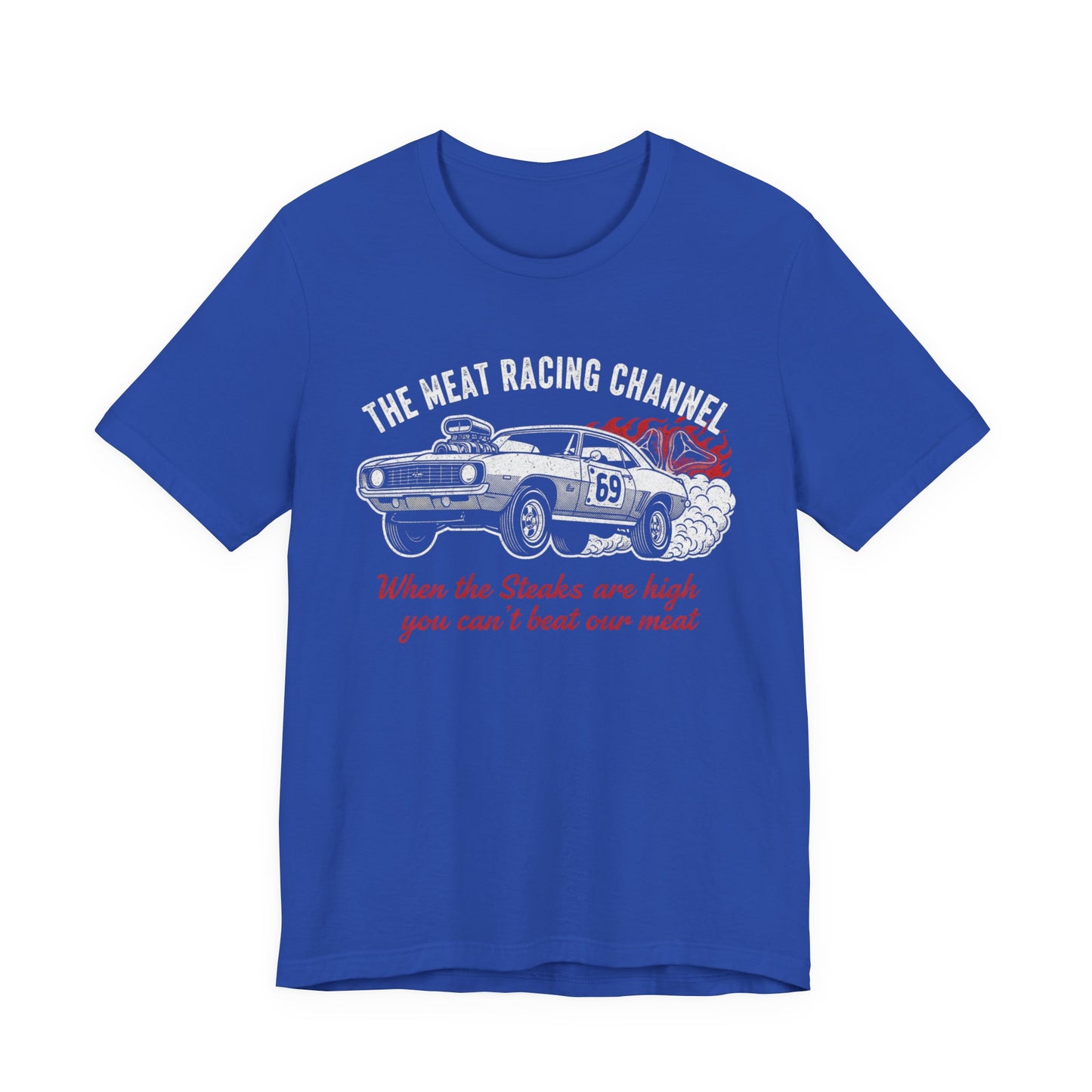 Blue Bella+Canvas 3001 T‑shirt with a bold graphic design. The print features a vintage muscle car with the number 69, white smoke and red flames, the distressed white title “The Meat Racing Channel” above, and the red script tagline “When the Steaks are high you can’t beat our meat” below. Funny drag racing parody shirt with retro hot rod style graphics.