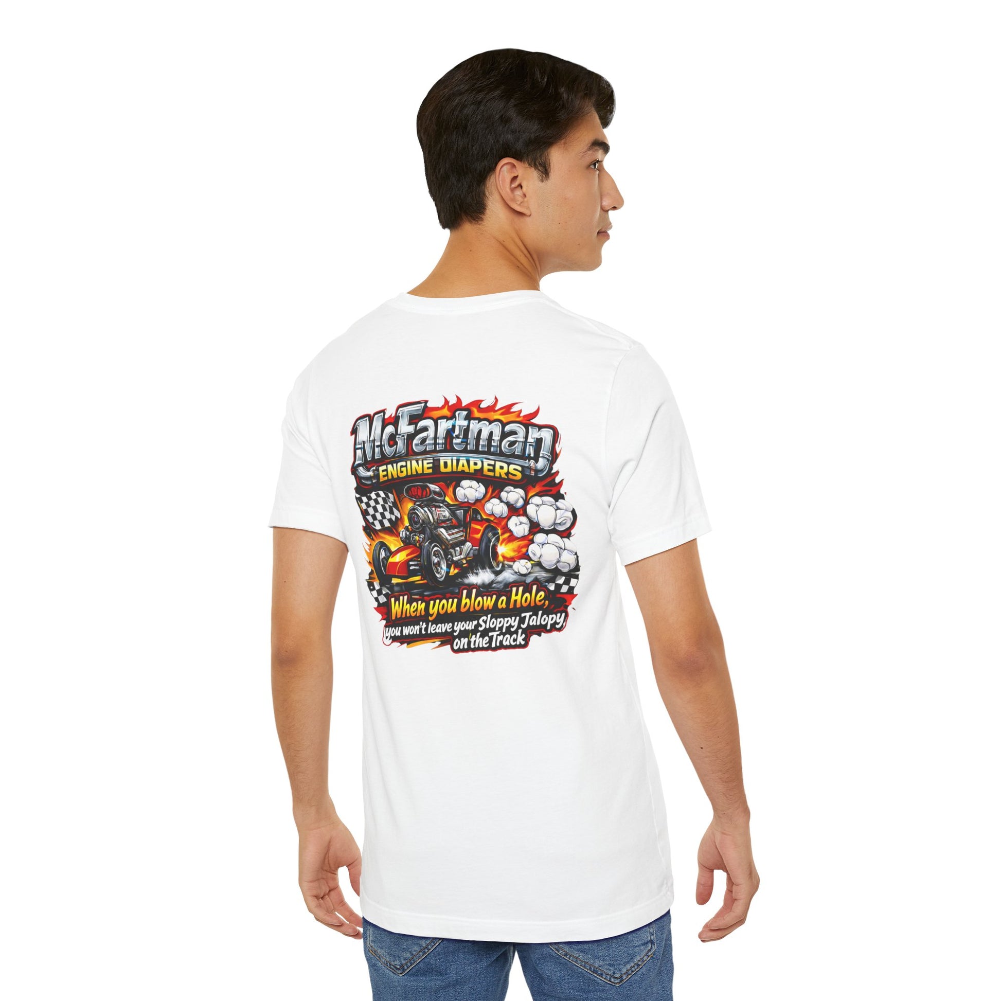 Person wearing a white t-shirt with a graphic design and 'McFartman Engine Diapers When you blow a Hole, you won't leave your Sloppy Jalopy on the Track' text on the back, standing against a white background