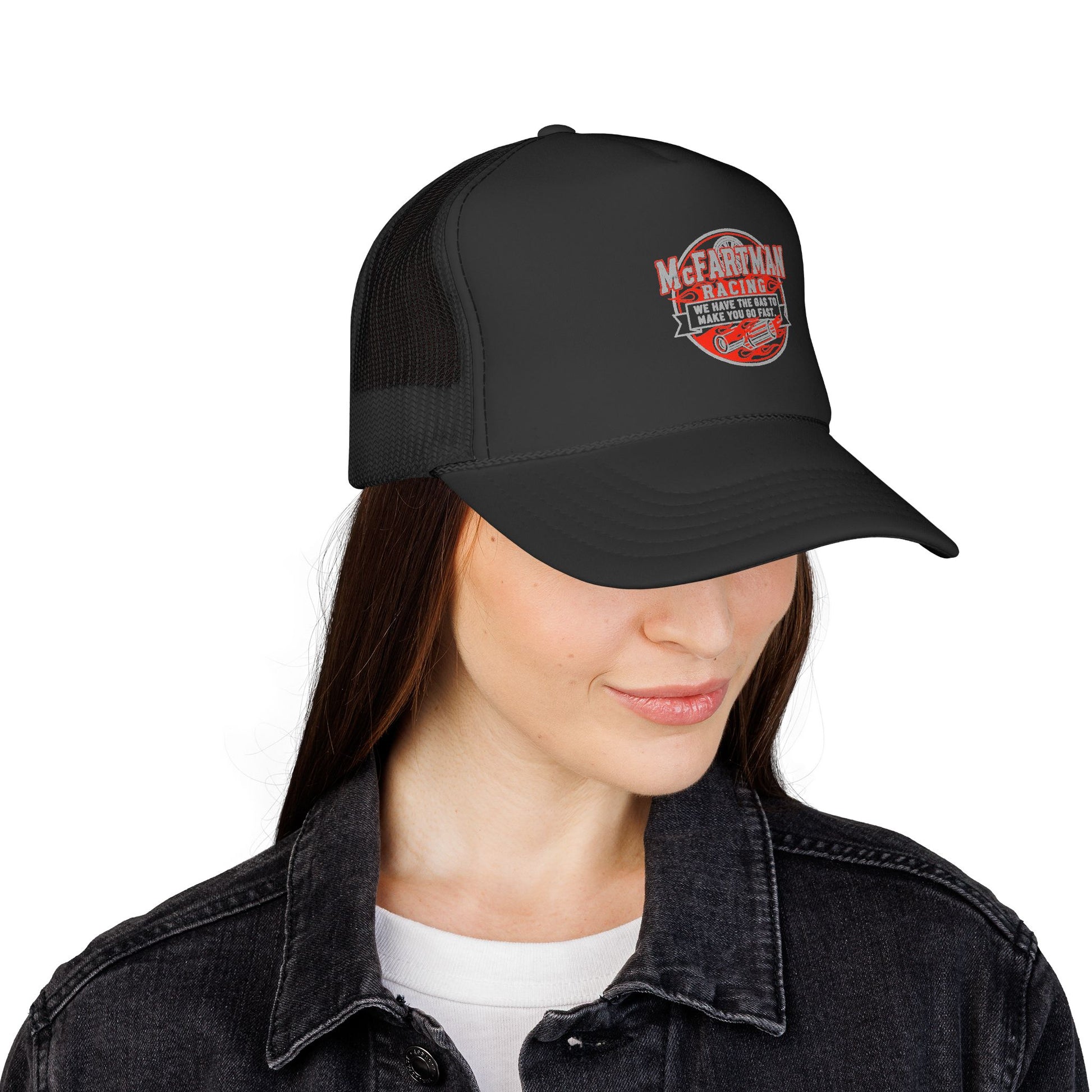 Person wearing a black cap with a logo McFARTMAN Racing We have the gas to make you go fast on a white background