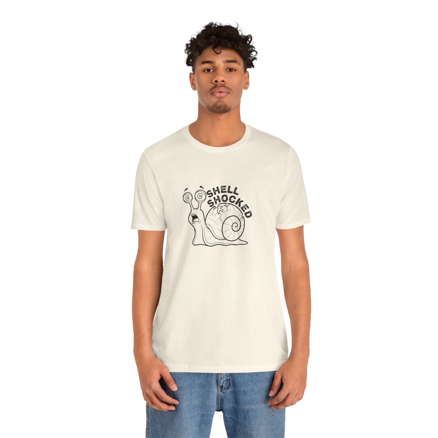Person wearing a white t-shirt with a graphic design 'Shell shocked' on a white background
