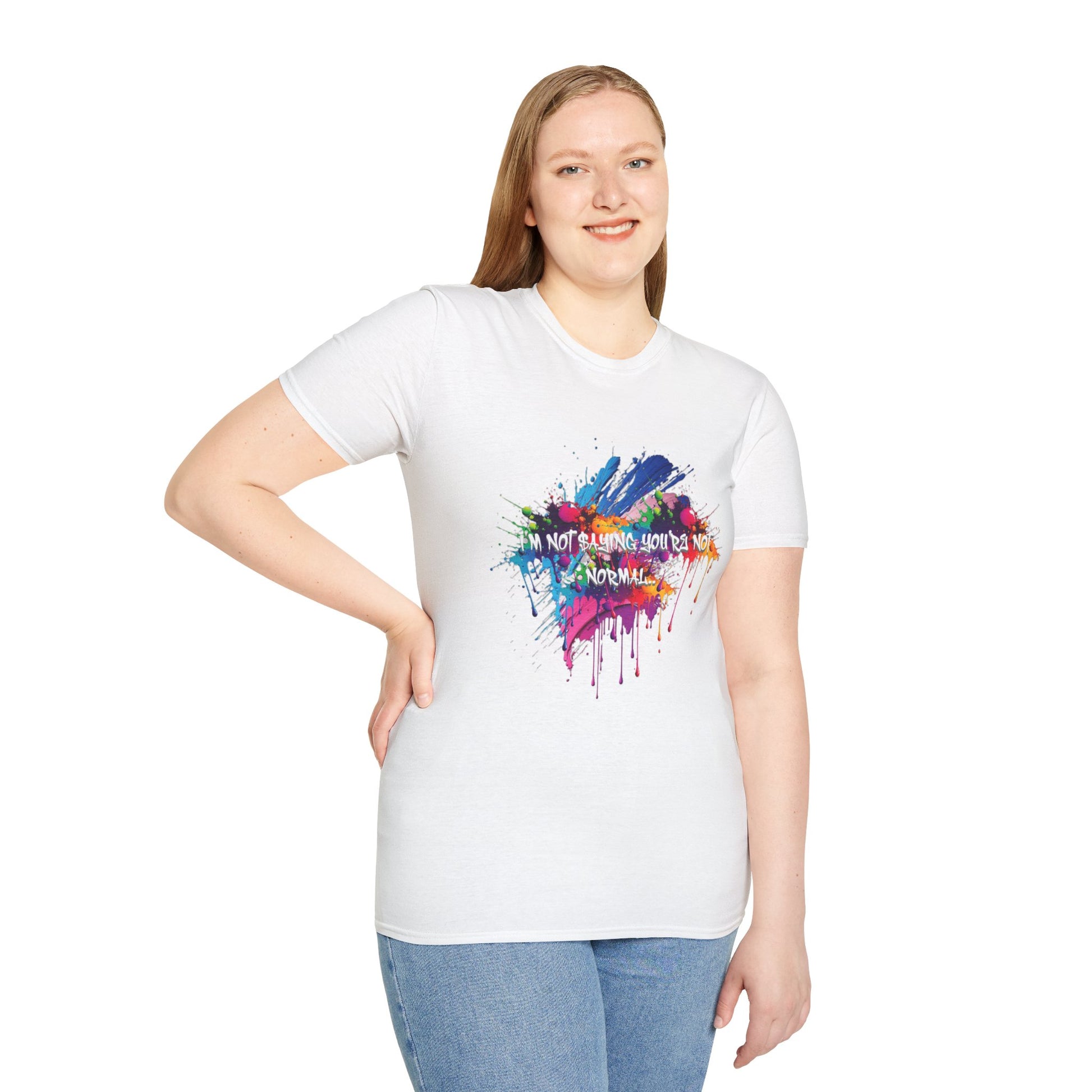 Person wearing a white t-shirt with a colorful heart design and text 'I'm not saying you're not normal' on a white background