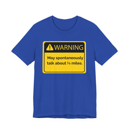Blue t-shirt with a yellow warning sign 'WARNING May spontaneously talk about 1/4 miles' graphic on a white background
