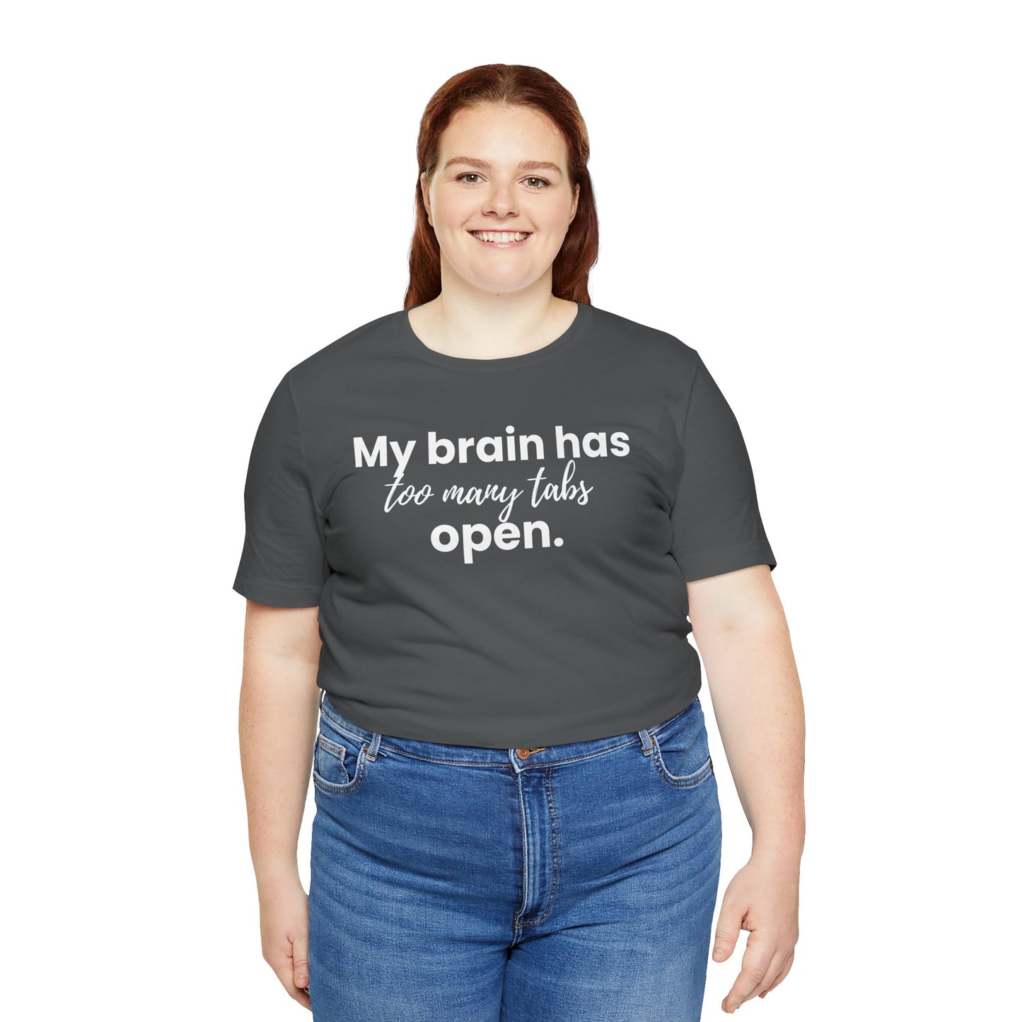 Person wearing a dark gray t-shirt with 'My brain has too many tabs open' text on a white background