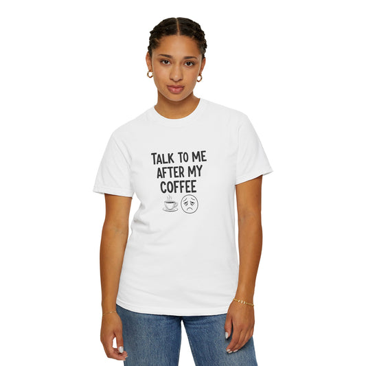 Person wearing a white t-shirt with text 'Talk to me after my coffee' and graphics on a white background