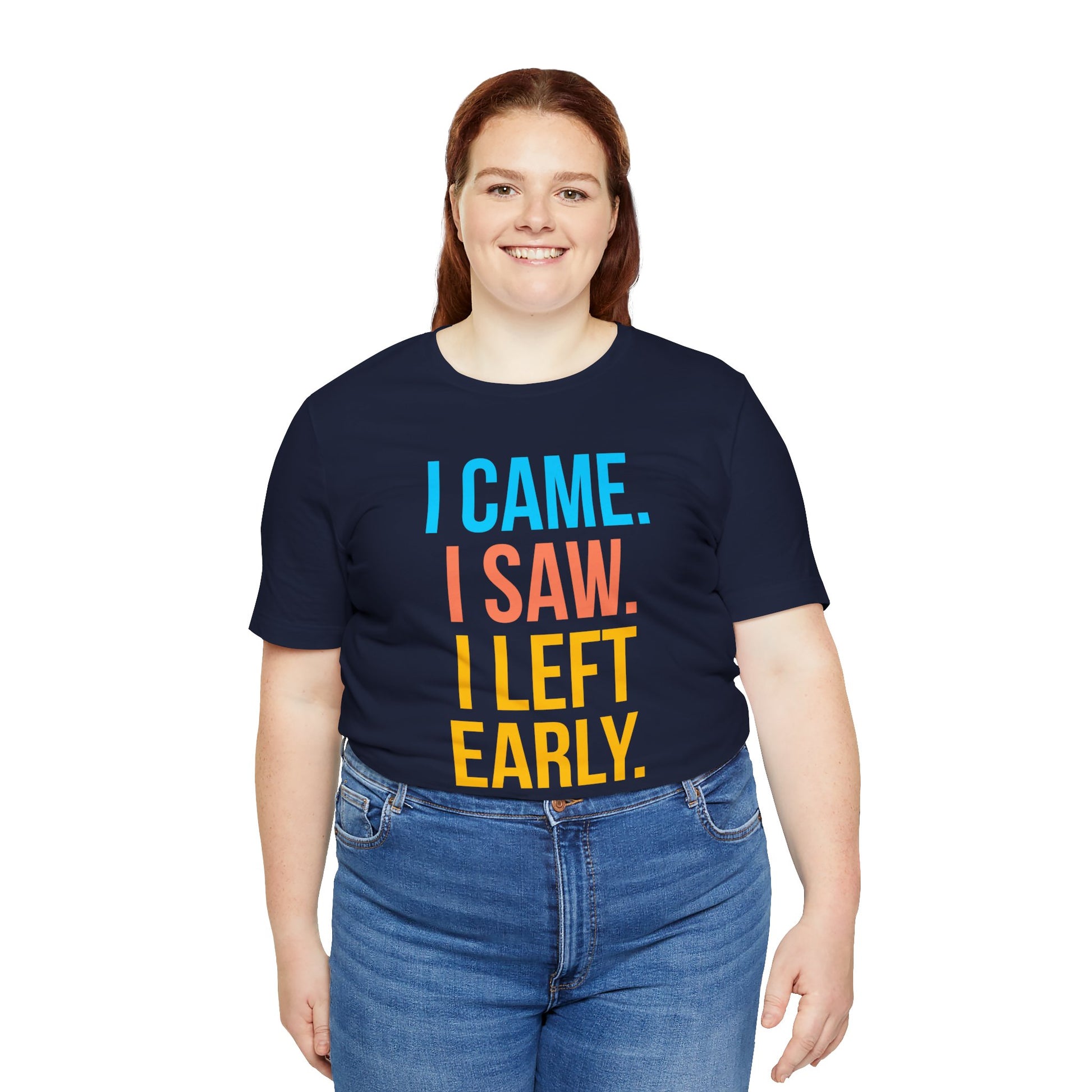 Person wearing a navy blue t-shirt with colorful text 'I CAME. I SAW. I LEFT EARLY.' on a white background