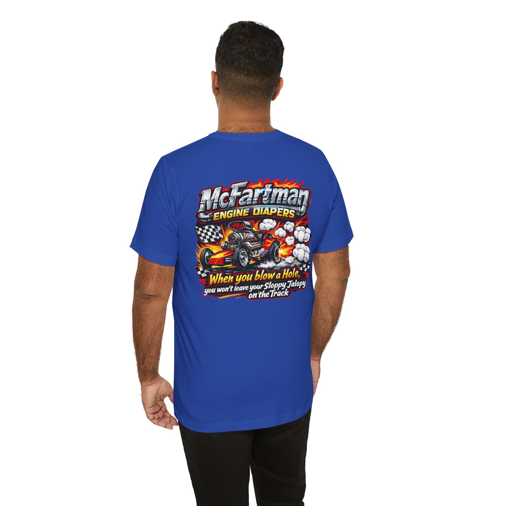 Man wearing a blue t-shirt with a graphic design and 'McFartman Engine Diapers When you blow a Hole, you won't leave your Sloppy Jalopy on the Track' text on the back, on a white background