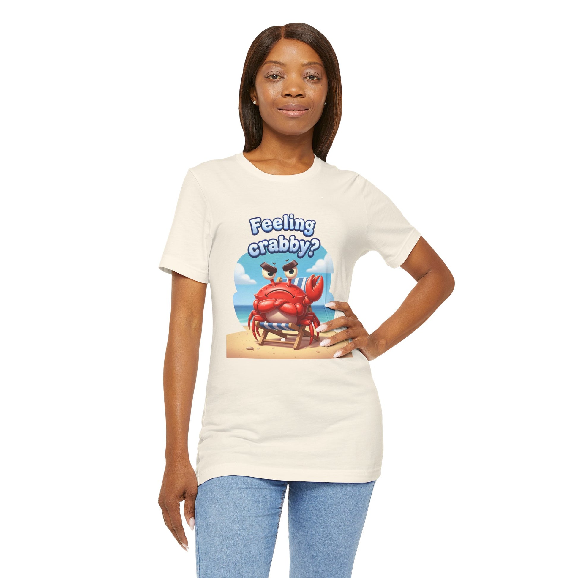 Woman wearing a t-shirt with a cartoon crab graphic and text 'Feeling crabby?' on a white background