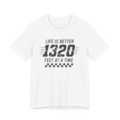 White t-shirt with black text 'Life is better 1320 feet at a time' on a white background
