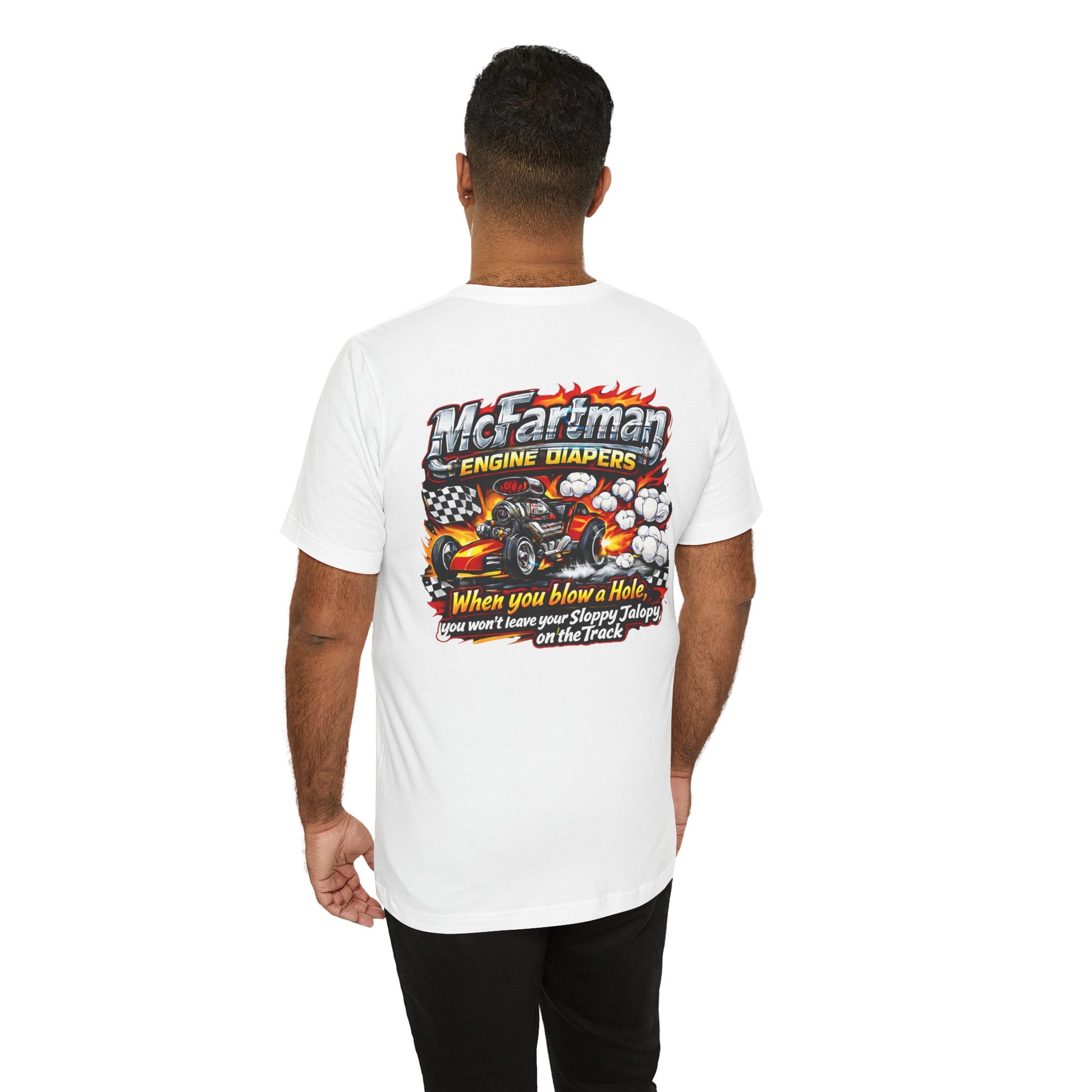 Person wearing a white t-shirt with a graphic design and 'McFartman Engine Diapers When you blow a Hole, you won't leave your Sloppy Jalopy on the Track' text on the back, standing against a white background