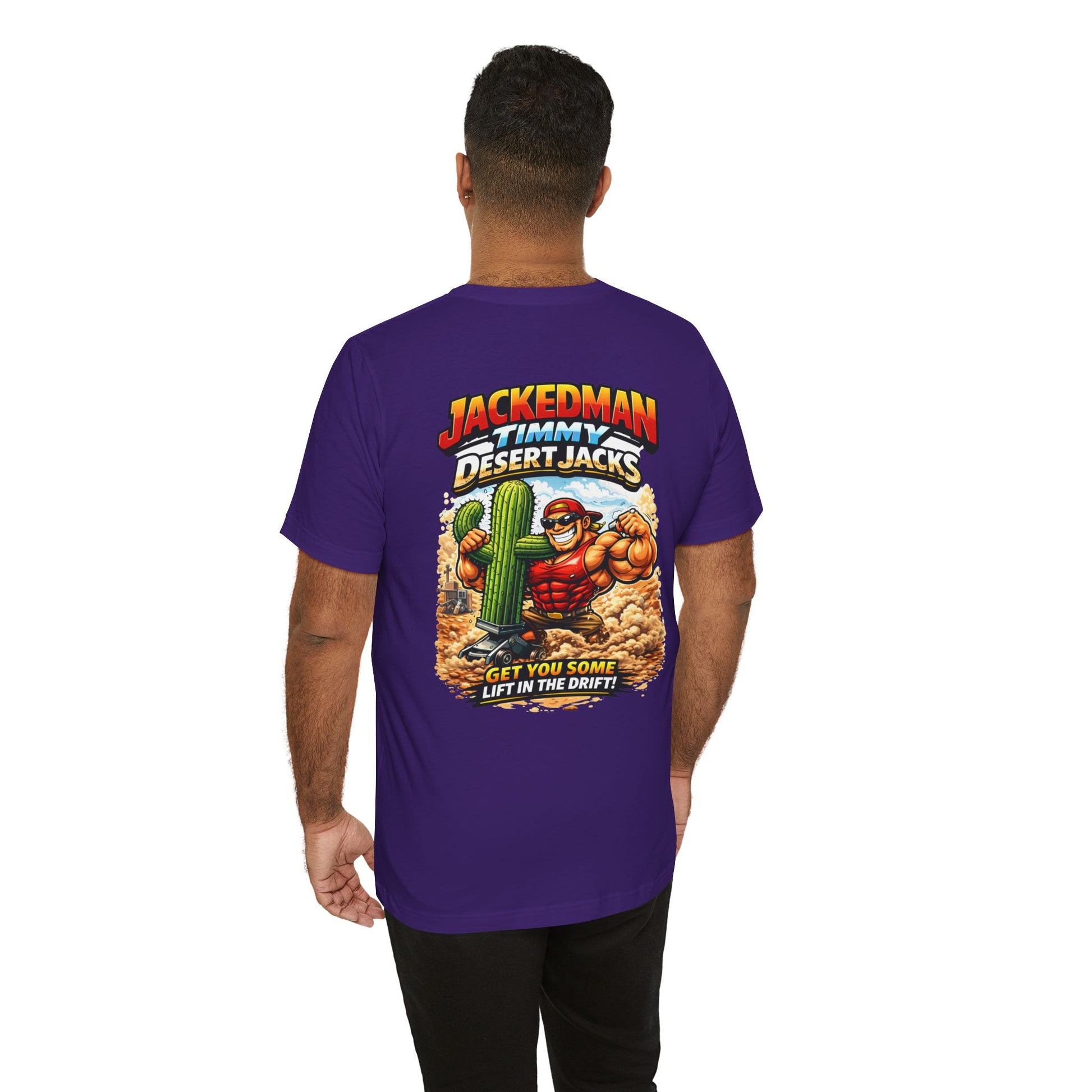 Man wearing a purple t-shirt with a graphic design on the back, featuring 'Jackedman Timmy Desert Jacks Get You Some Lift In The Drift' text and images.