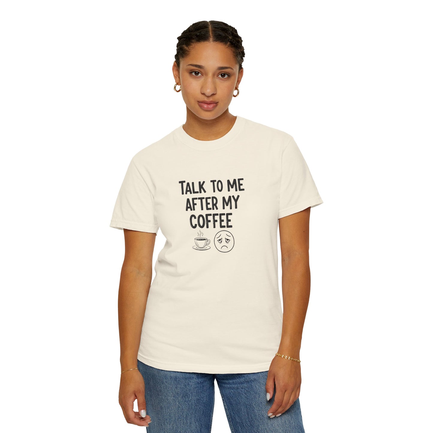 Person wearing a white t-shirt with text 'Talk to me after my coffee' and graphics on a white background
