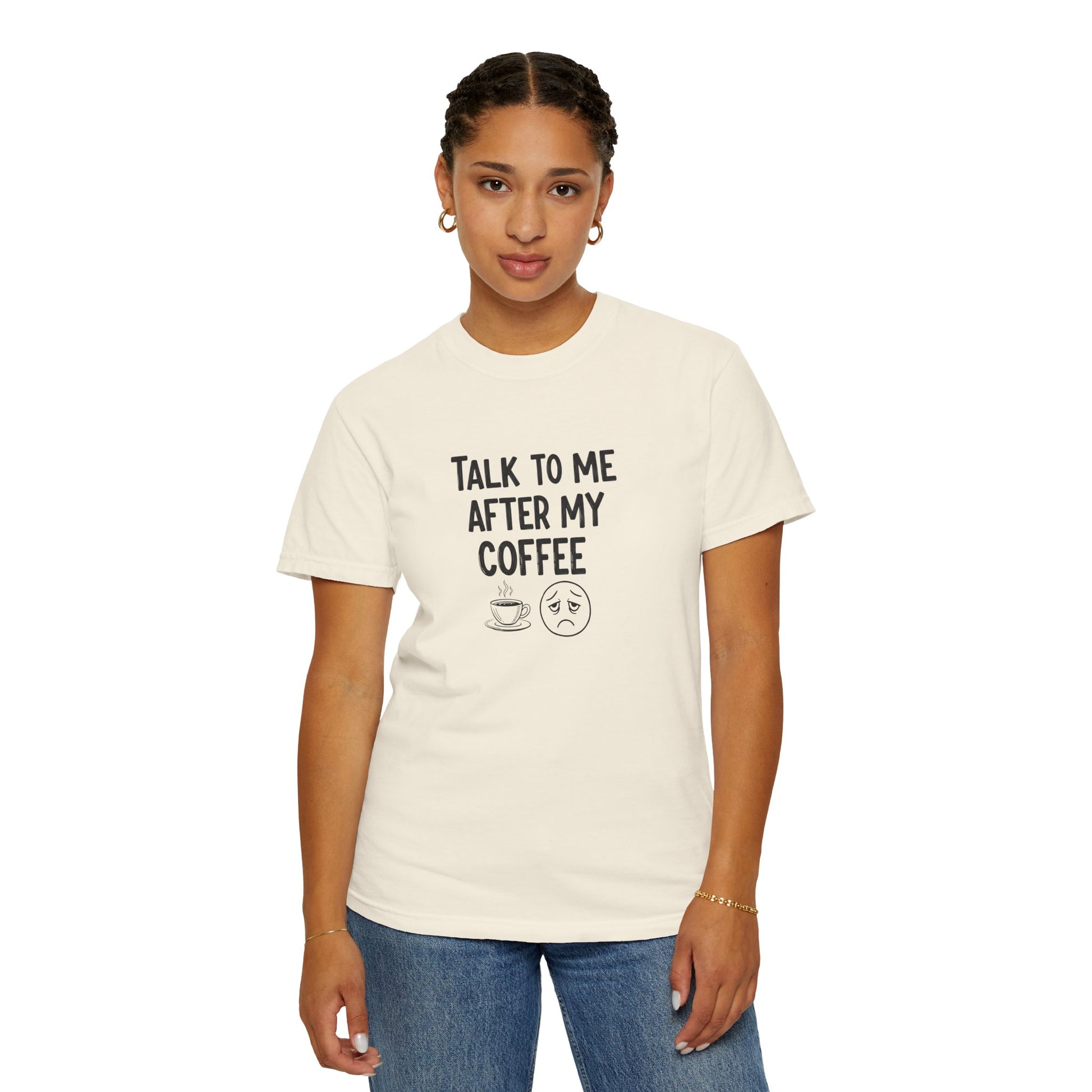 Person wearing a white t-shirt with text 'Talk to me after my coffee' and graphics on a white background