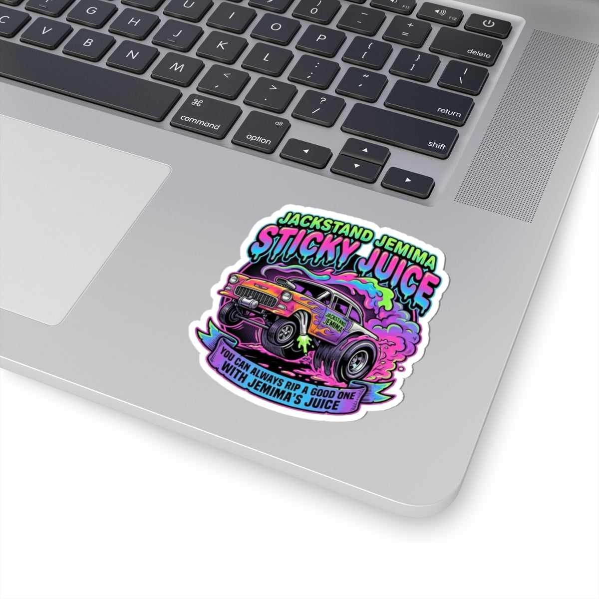 Sticker with colorful 
Jackstand Jemima Sticky Juice' design on a laptop