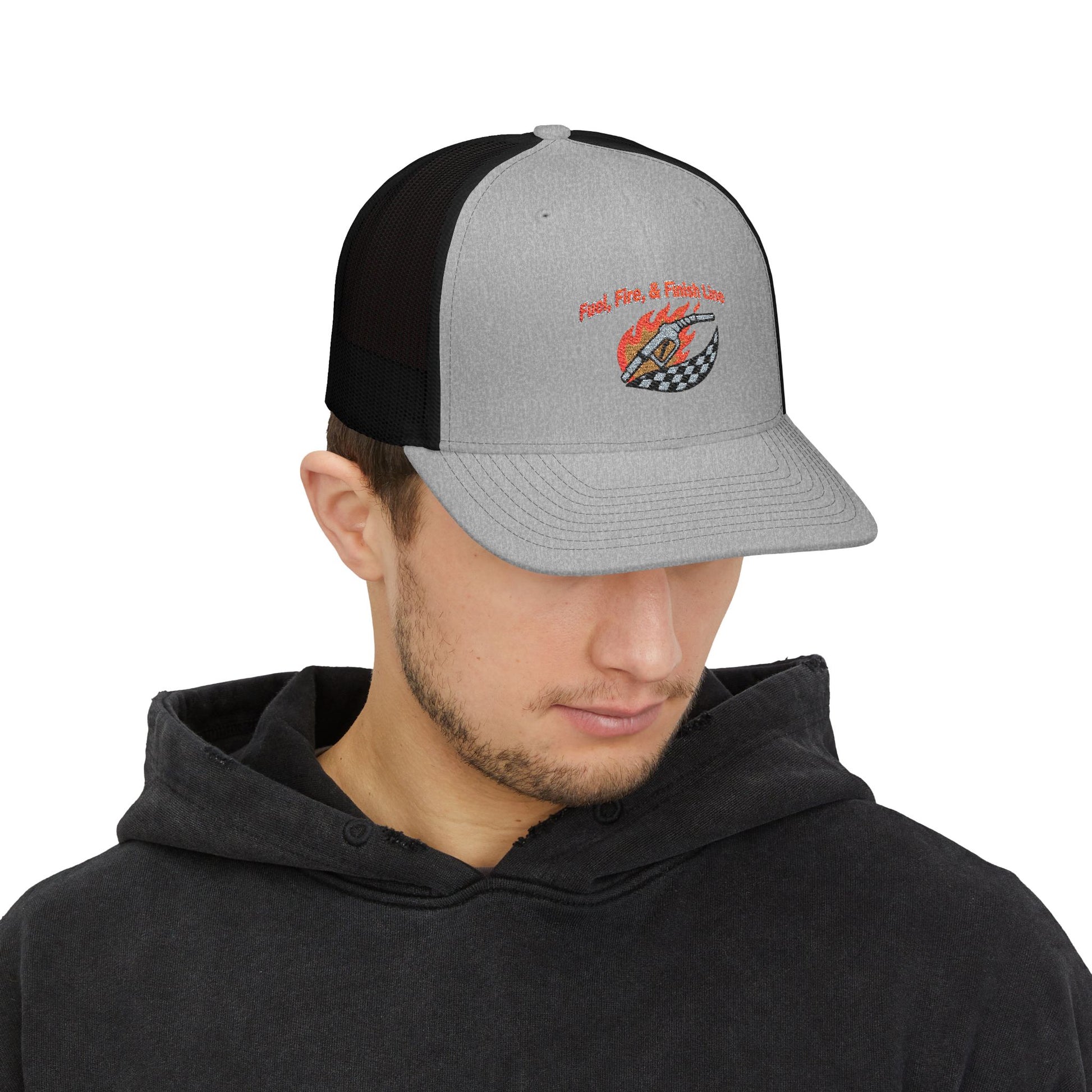 Man wearing a black and gray cap with a logo and text 'Fuel, Fire & Finish Line' on a white background