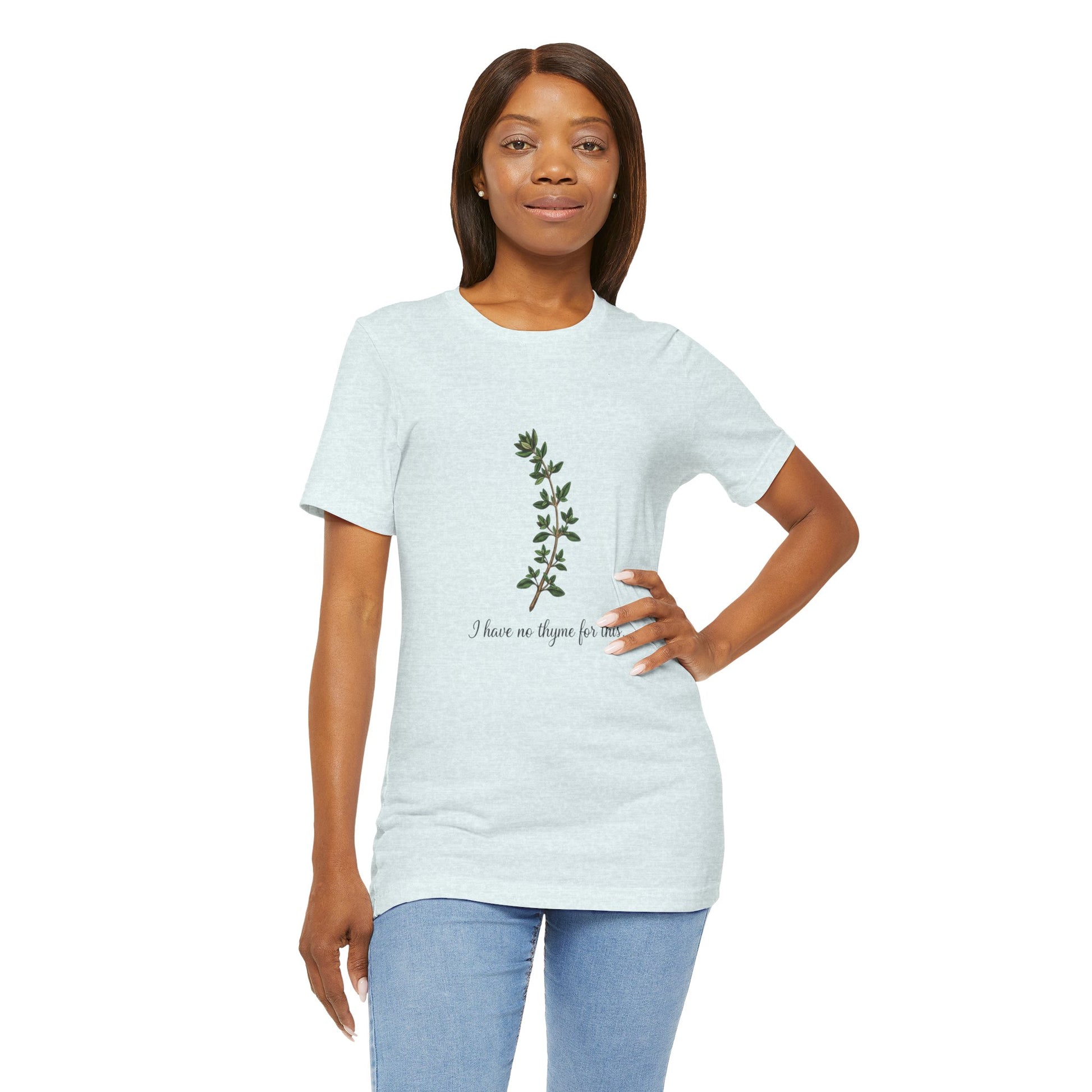 Woman wearing a light blue t-shirt with a design and text 'I have no thyme for this' on a white background