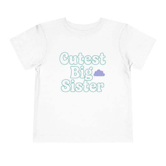 White t-shirt with 'Cutest Big Sister' text on a white background