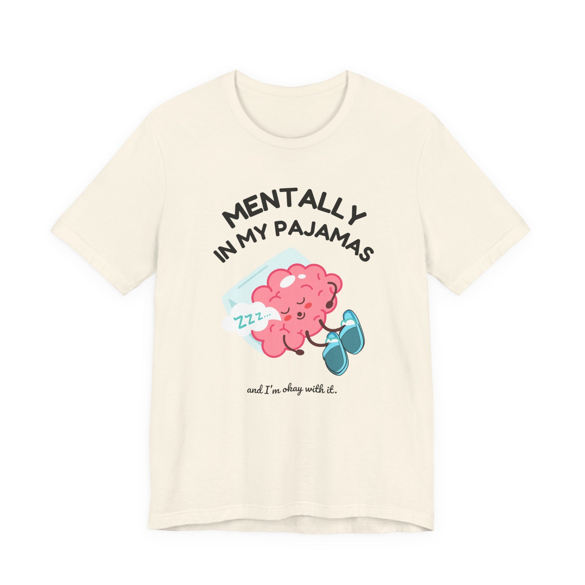 Beige t-shirt with a cartoon brain design and text 'Mentally in my pajamas and I'm ok with it' on a white background