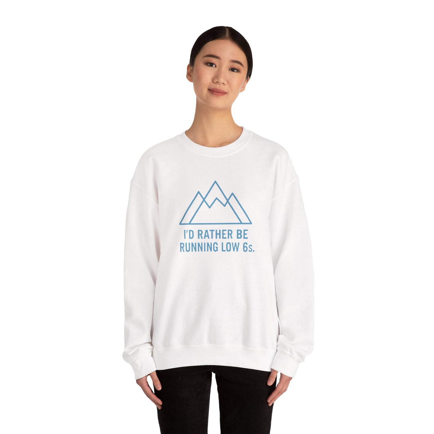 Person wearing a white sweatshirt with blue mountain graphic and text 'I'd rather be running low 6s'on a white background