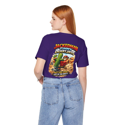 Person wearing a purple t-shirt with a graphic design and 'Jackedman Timmy Desert Jacks Get You Some Lift In The Drift' text on the back, standing against a white background