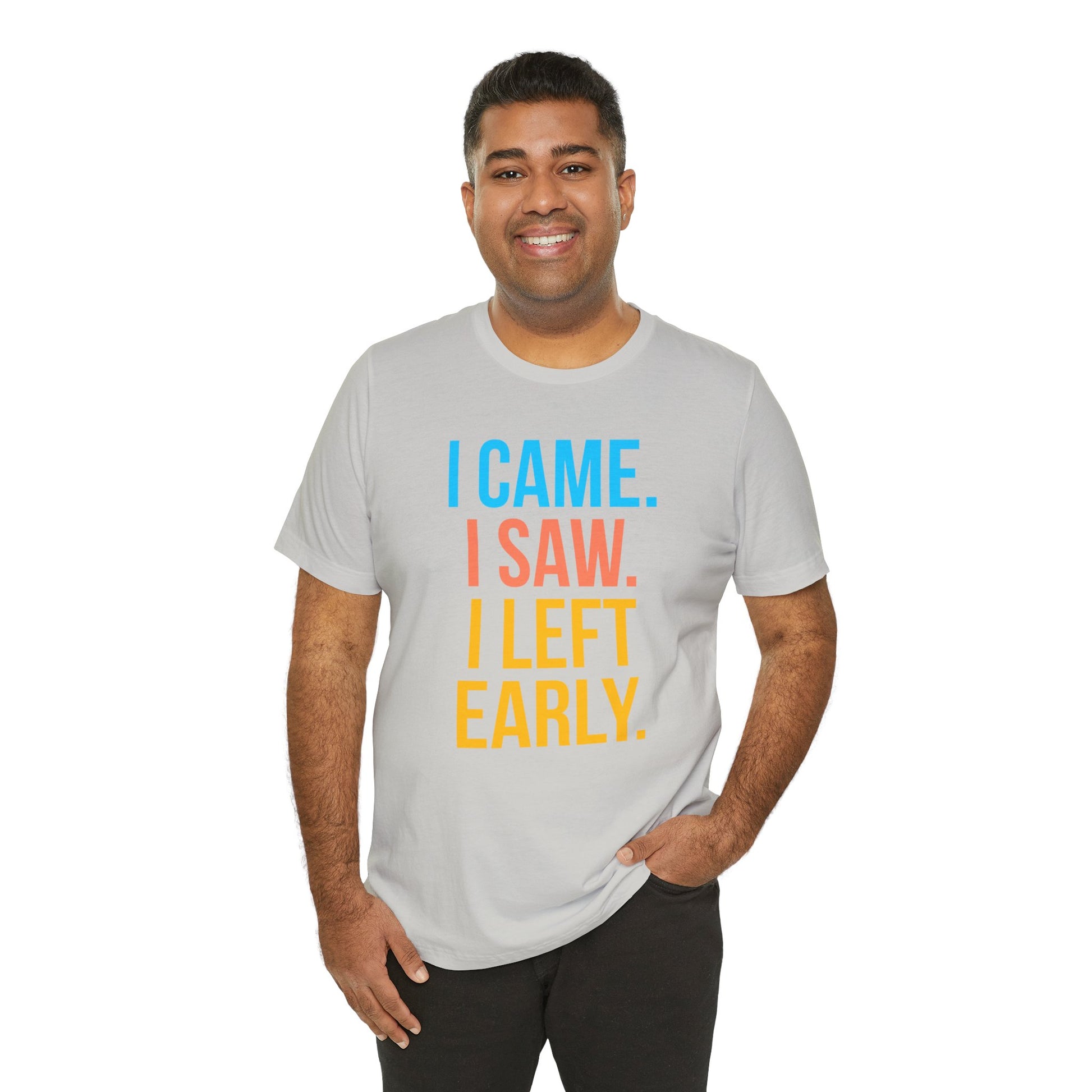 Man wearing a gray t-shirt with colorful text 'I CAME. I SAW. I LEFT EARLY.' on a white background