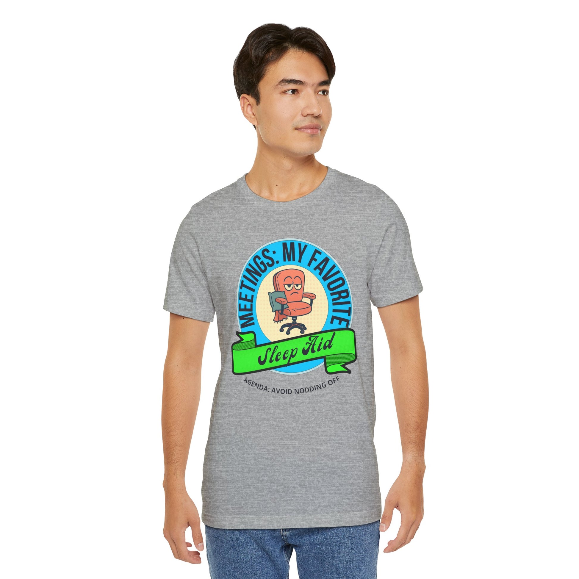 Man wearing a gray t-shirt with a colorful graphic design on a white background