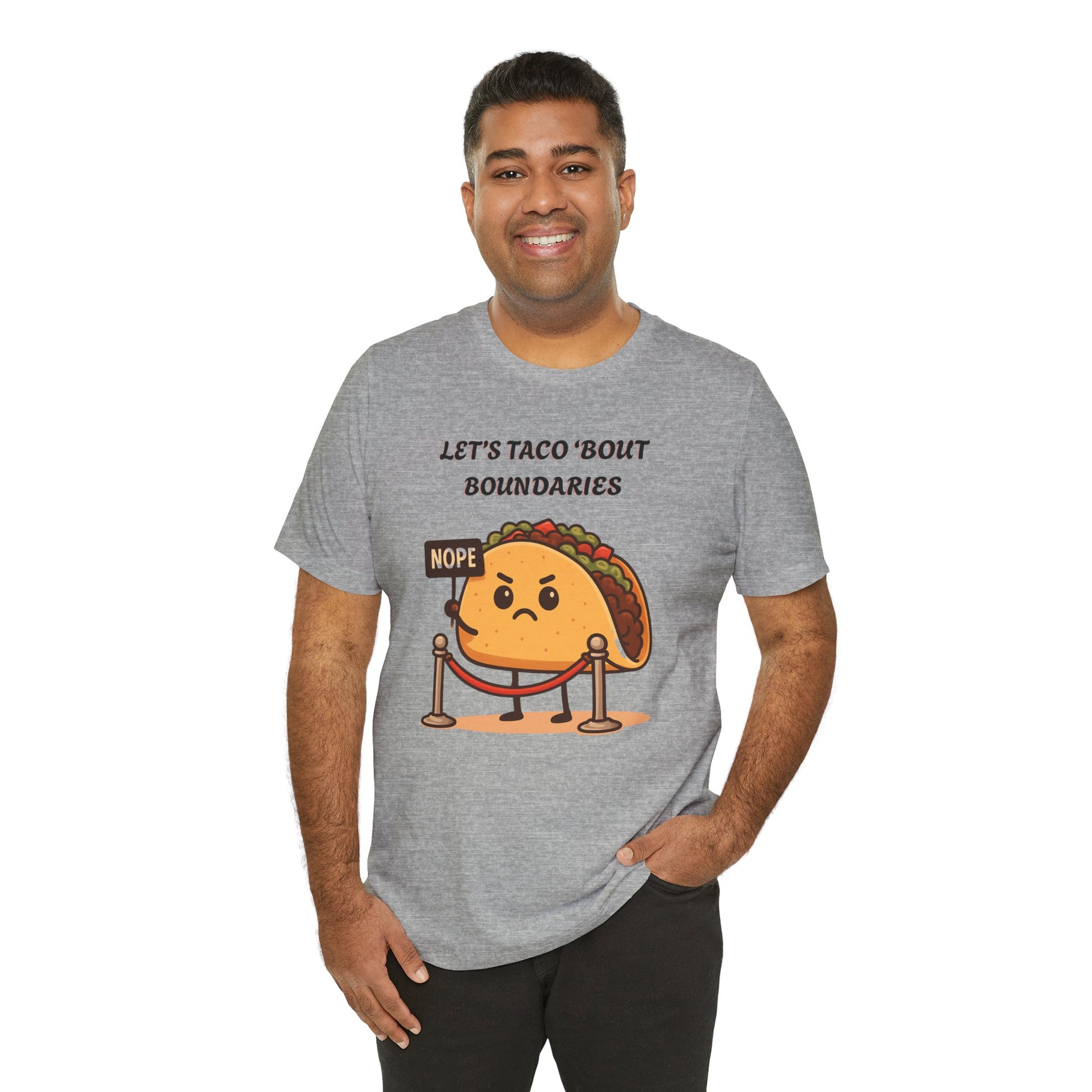 Man wearing a gray t-shirt with a taco graphic and text 'Let's taco 'bout boundaries', on a white background