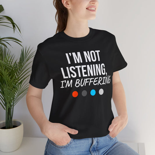 Person wearing a black t-shirt with 'I'm not listening, I'm buffering' text.
