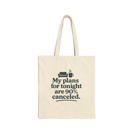 Beige tote bag with humorous text 'My plans for tonight are 90% canceled' design on a white background