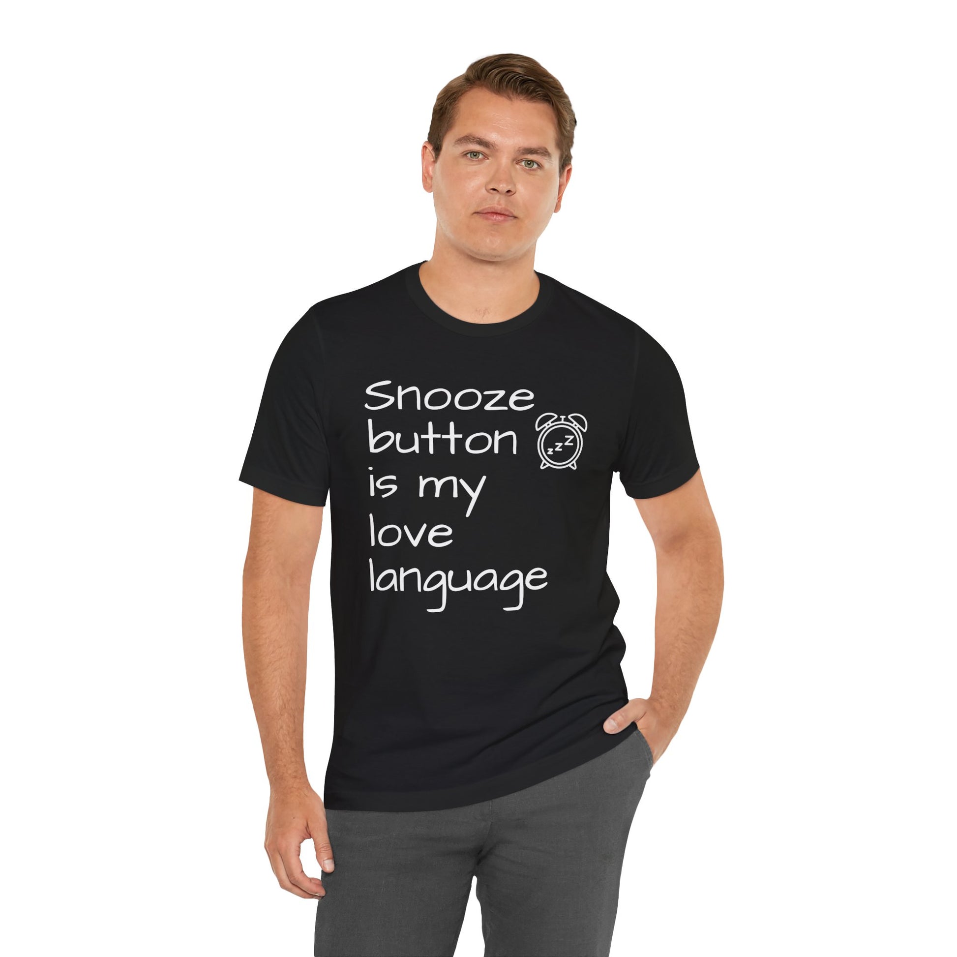 Man wearing a black t-shirt with text 'Snooze button is my love language' on a white background