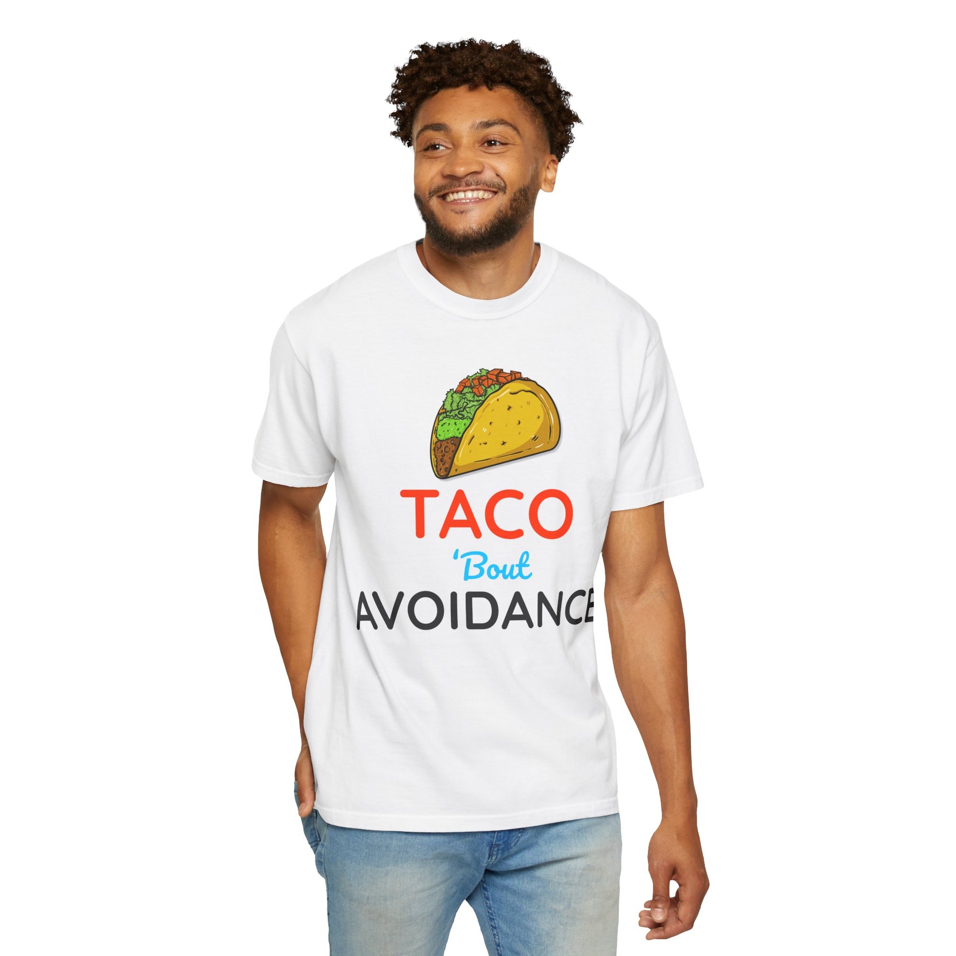 Man wearing a white t-shirt with a taco graphic and text 'Taco 'bout avoidance' on a white background